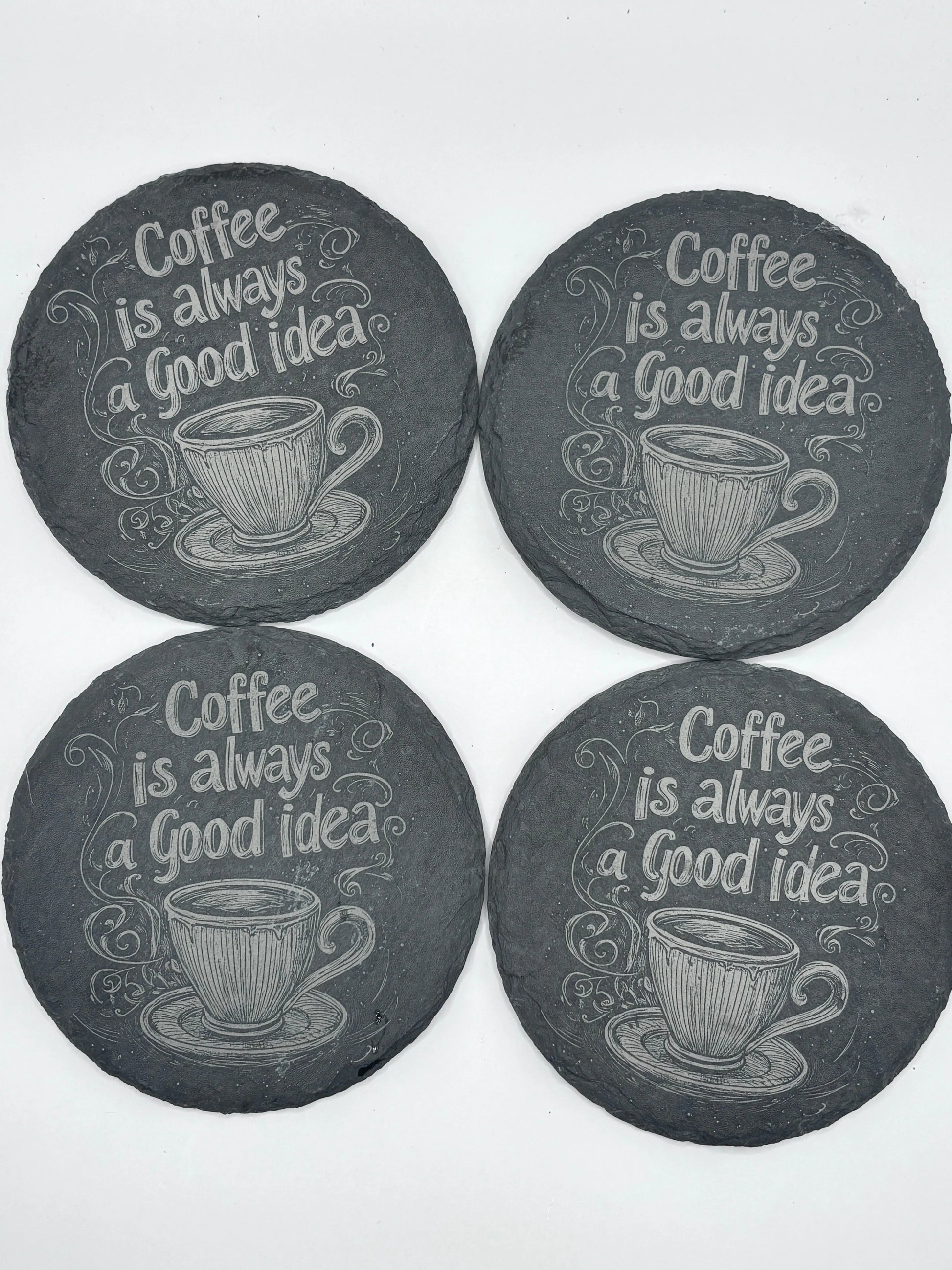 Underlägg i skiffer 4-pack – stilrena skydd för bord
